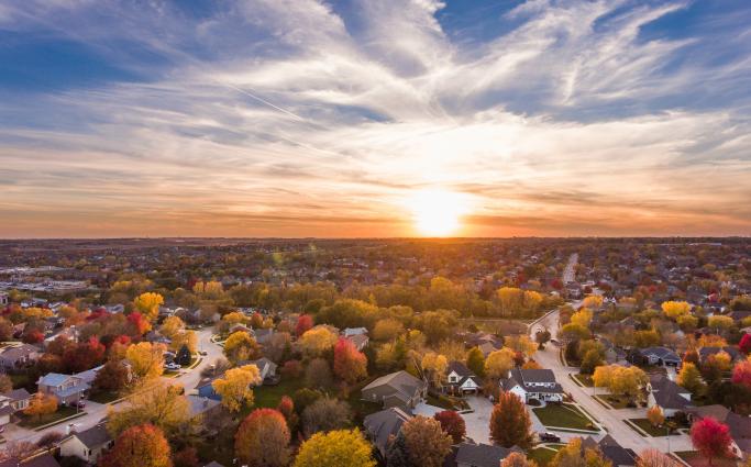 Sunset over suburban town