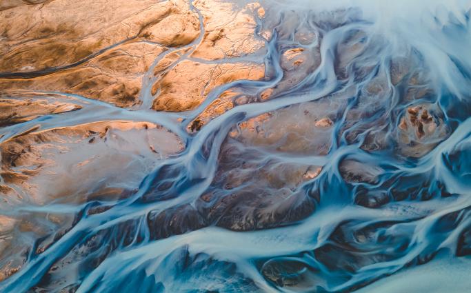 A glacial rivers from above. Aerial photograph of the river streams from Icelandic glaciers. 