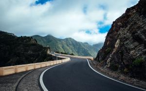 Winding road leading to mountains