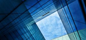 Blue sky through building