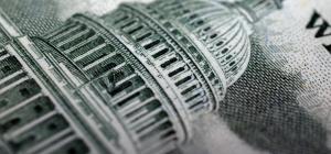 Capital building on dollar bill