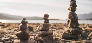 Tower of balancing rocks on beach